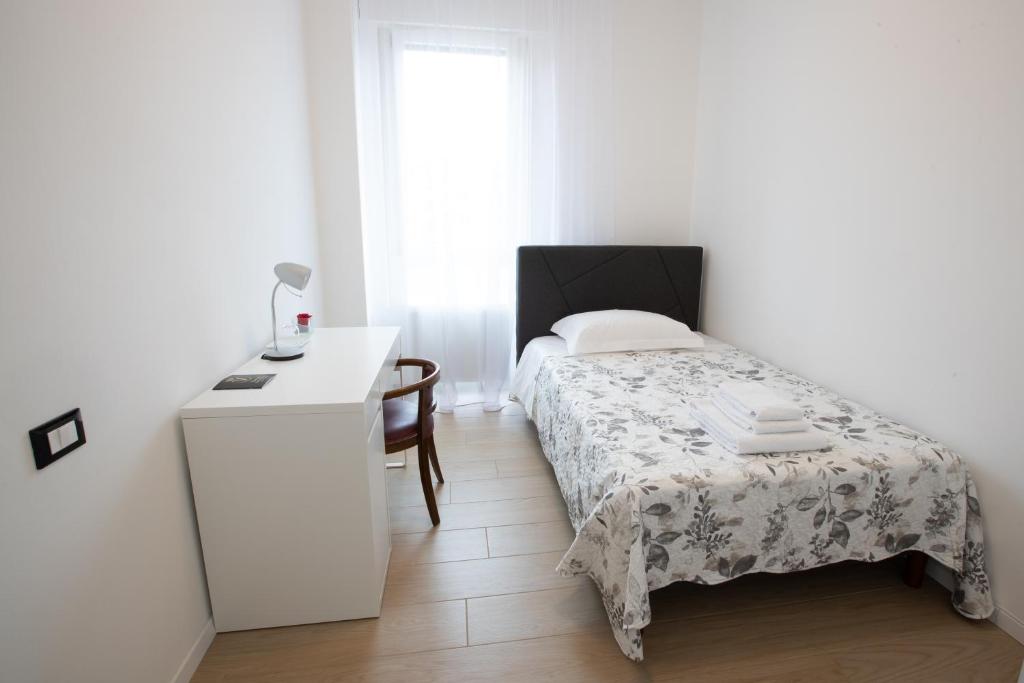Postel nebo postele na pokoji v ubytování BB Elite Berchet