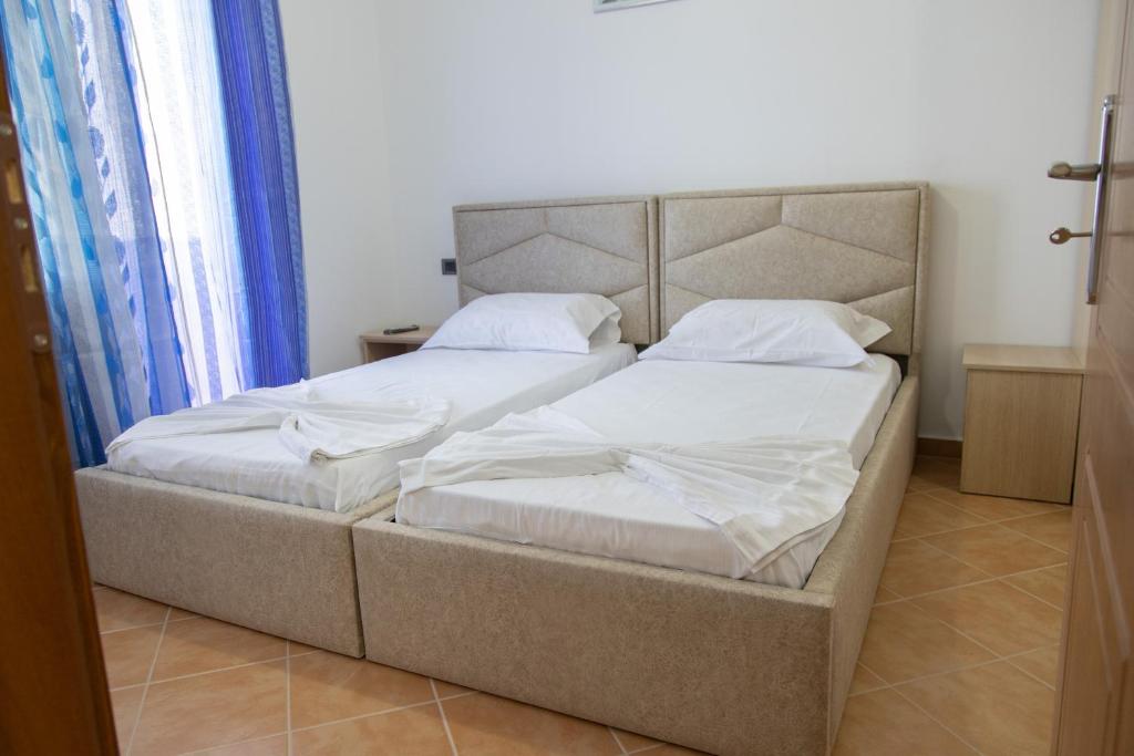 Postel nebo postele na pokoji v ubytování Villa Dei Limoni