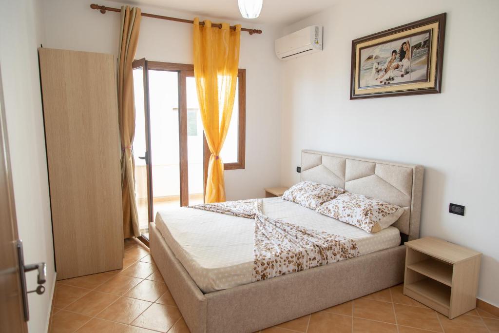 Postel nebo postele na pokoji v ubytování Villa Dei Limoni