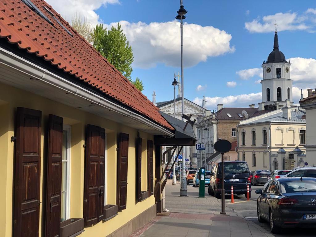 a city street with cars parked on the street at Bed&Blues in Vilnius