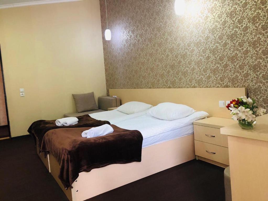 Postel nebo postele na pokoji v ubytování Guest House Vanda