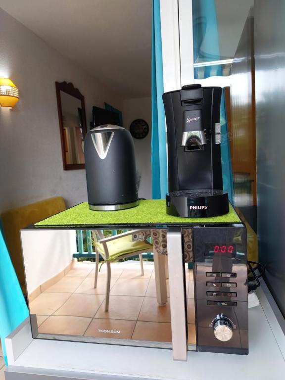 Kuchyň nebo kuchyňský kout v ubytování Au petit Régal