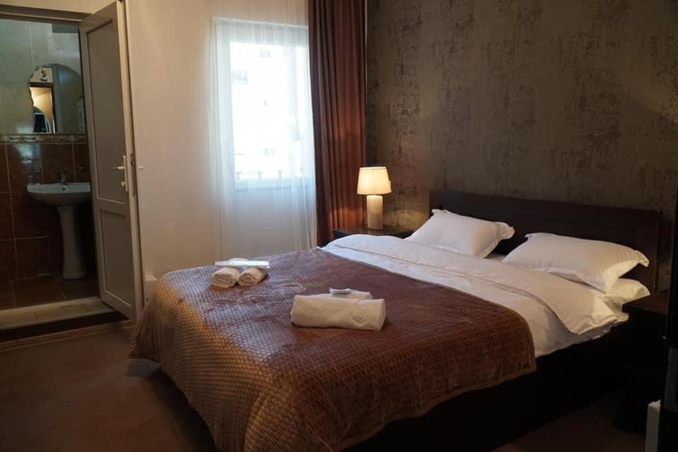 Postel nebo postele na pokoji v ubytování Guest House Vanda
