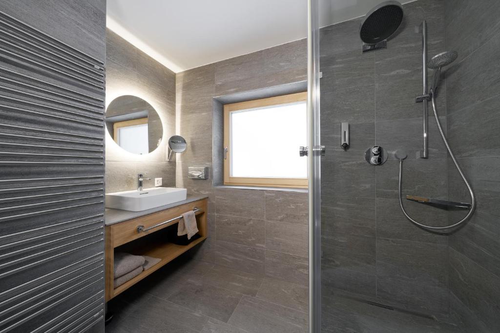 Koupelna v ubytování Aparthotel Grischuna