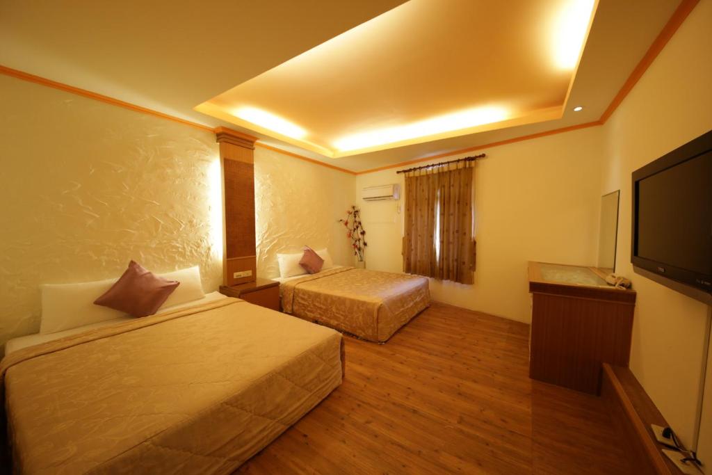 Postel nebo postele na pokoji v ubytování Goden Beach B&B