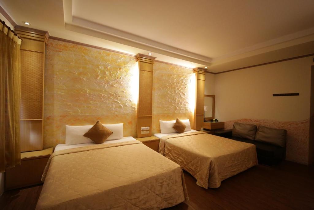 Postel nebo postele na pokoji v ubytování Goden Beach B&B