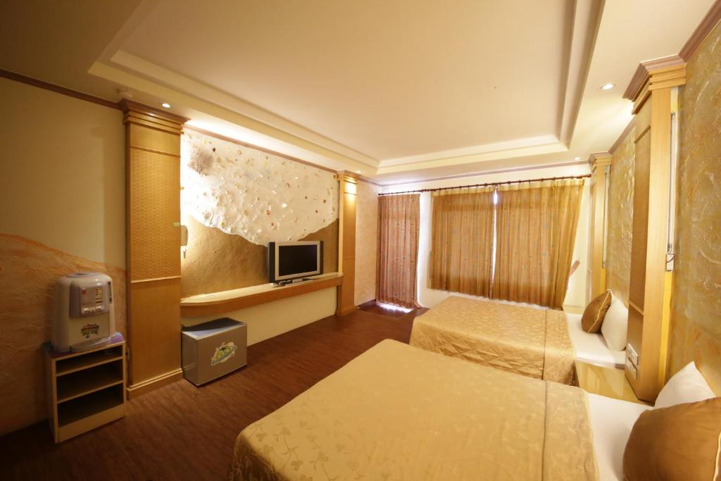 Postel nebo postele na pokoji v ubytování Goden Beach B&B