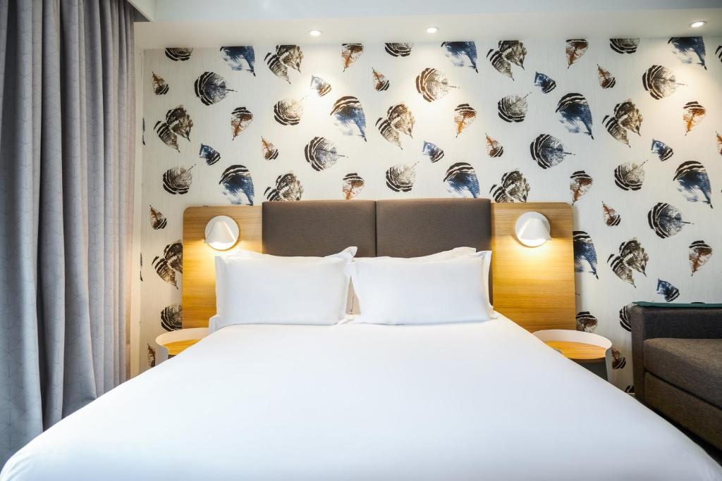 Кровать или кровати в номере Holiday Inn Perpignan by IHG
