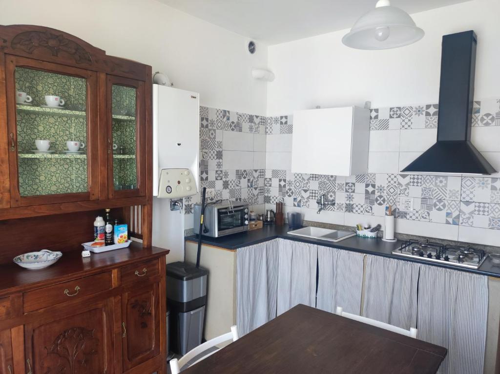 Kuchyň nebo kuchyňský kout v ubytování Stone Way Apartment