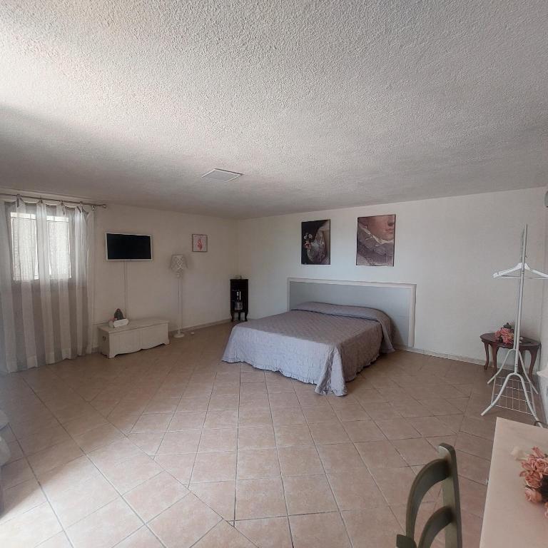 TV a/nebo společenská místnost v ubytování Podere Grandolfi B&B
