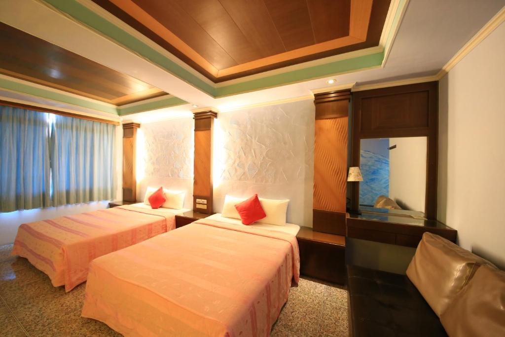 Postel nebo postele na pokoji v ubytování Goden Beach B&B