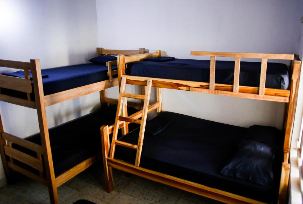 Postel nebo postele na pokoji v ubytování Cabaña Perla Azul