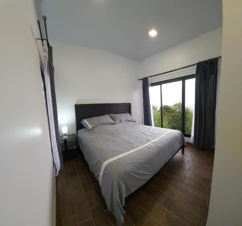 Postel nebo postele na pokoji v ubytování Casa de montaña Arisa