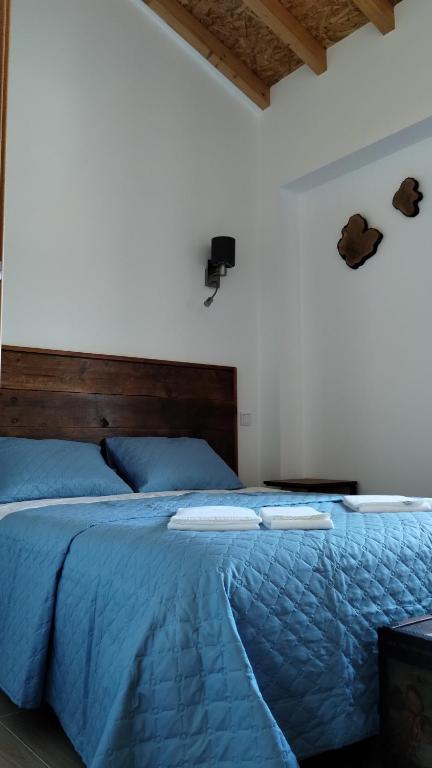 Postel nebo postele na pokoji v ubytování Quinta do Oratório Agroturismo