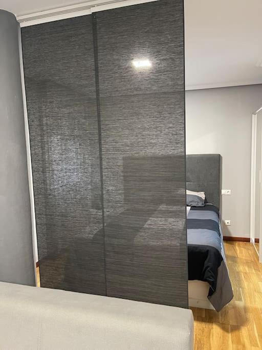 Postel nebo postele na pokoji v ubytování Acogedor apartamento en Gijón , VUT1020AS