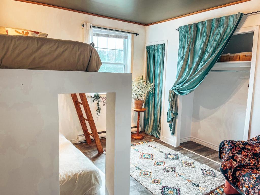 Postel nebo postele na pokoji v ubytování Auberge Mandala