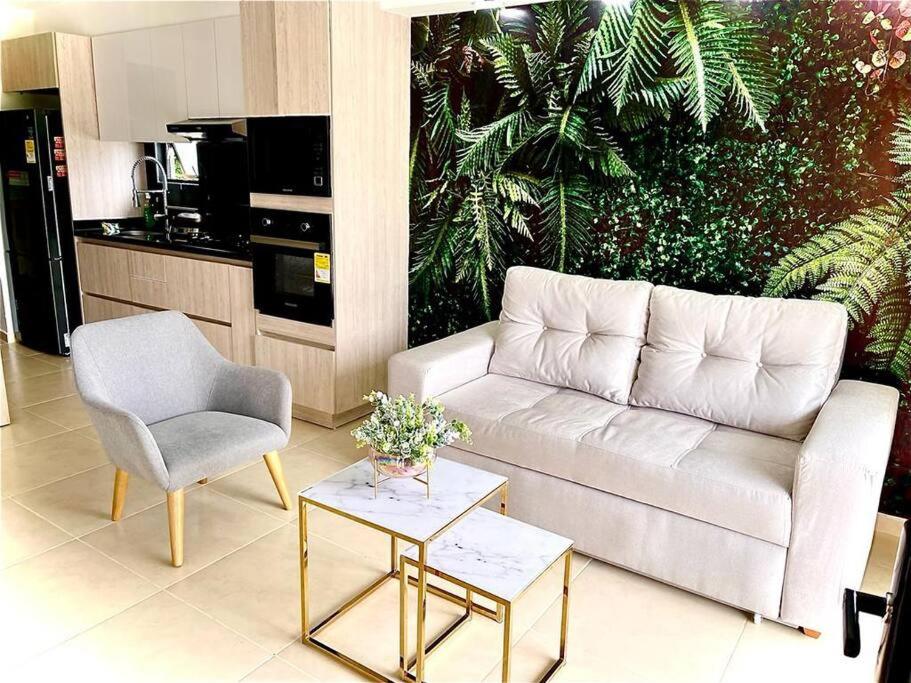 Area tempat duduk di Descanso y Confort 3 Luxury
