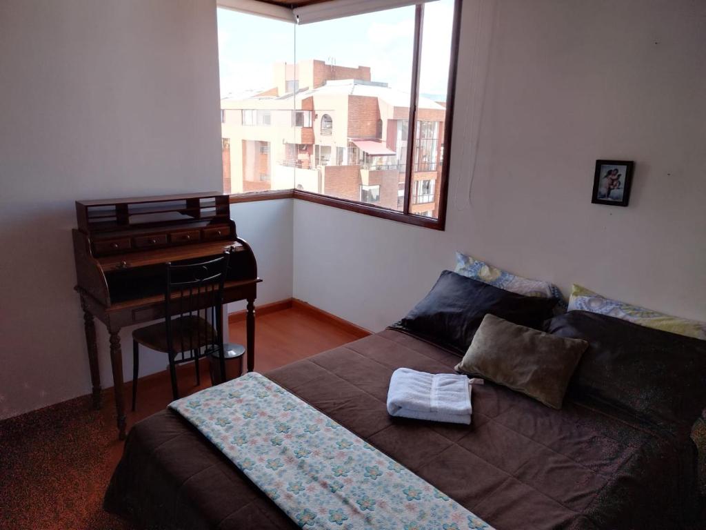 Postel nebo postele na pokoji v ubytování Elias Di Caprio - Habitaciones -