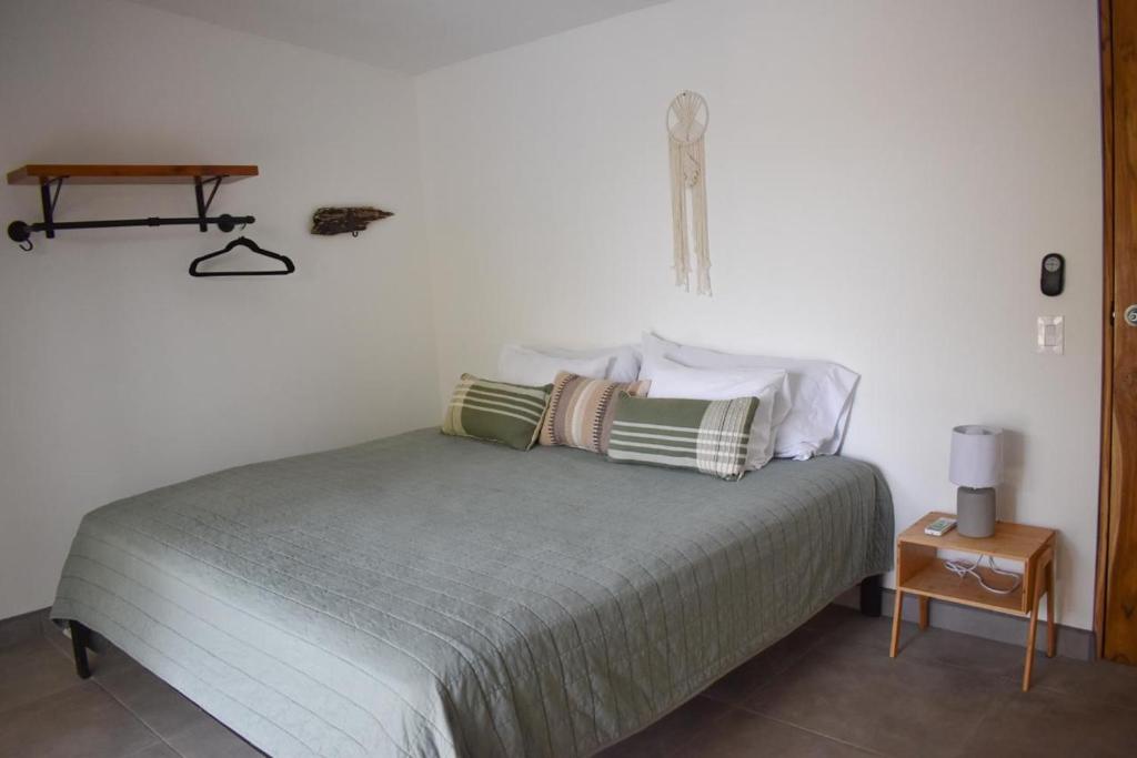 Postel nebo postele na pokoji v ubytování Blue Window Boutique Villas Hotel