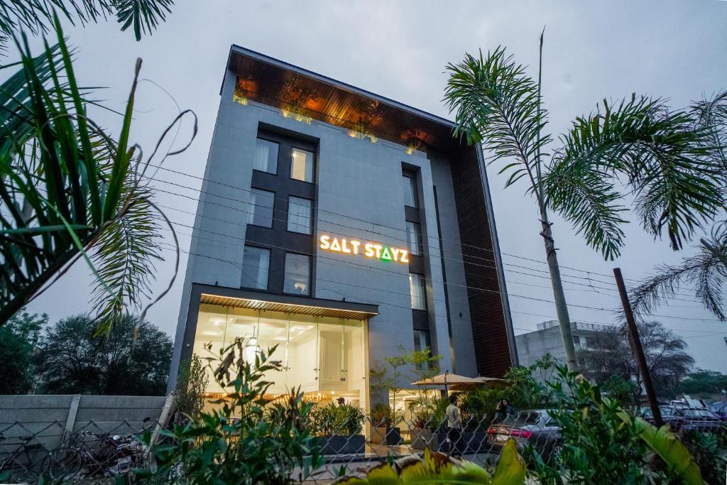 a building with a sign that reads salt strift at Saltstayz Basil - Near Golf Course Road & Extension Road in Gurgaon