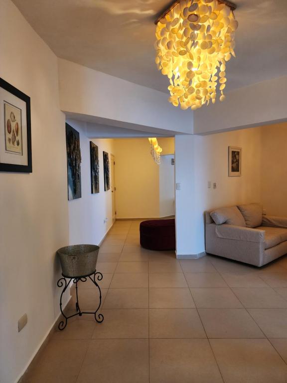 Posezení v ubytování 3 bedroom, front of the beach and pool