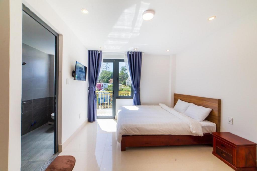 Giường trong phòng chung tại Đà Lạt Cao Nguyên Hotel