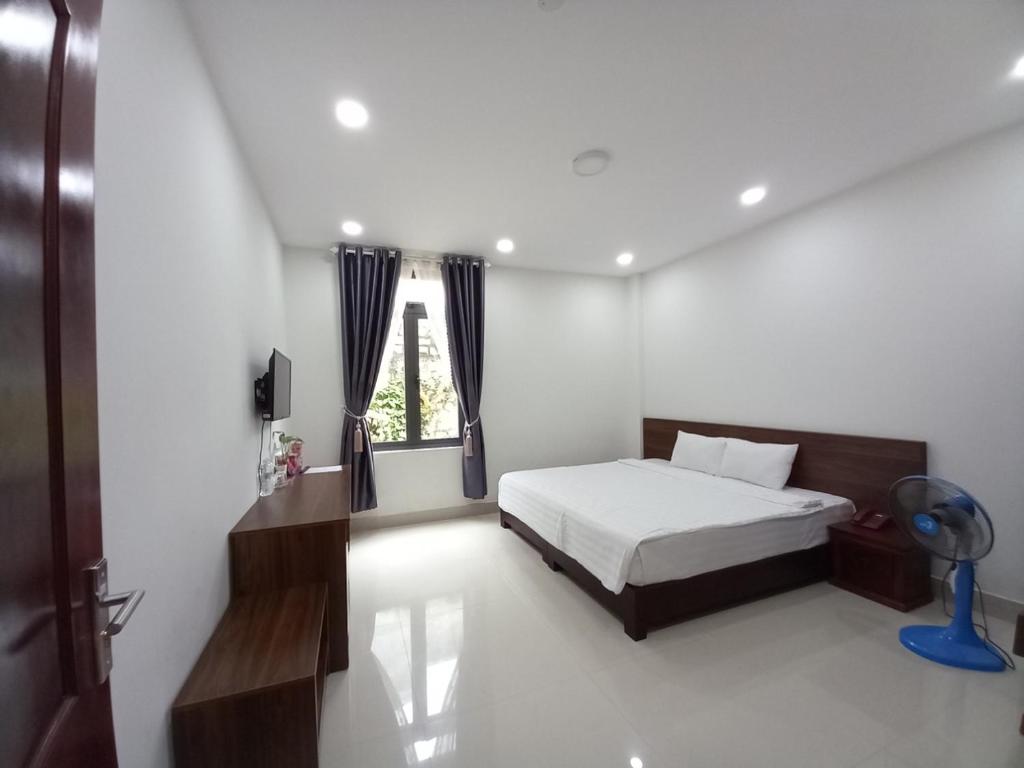 Giường trong phòng chung tại Đà Lạt Cao Nguyên Hotel