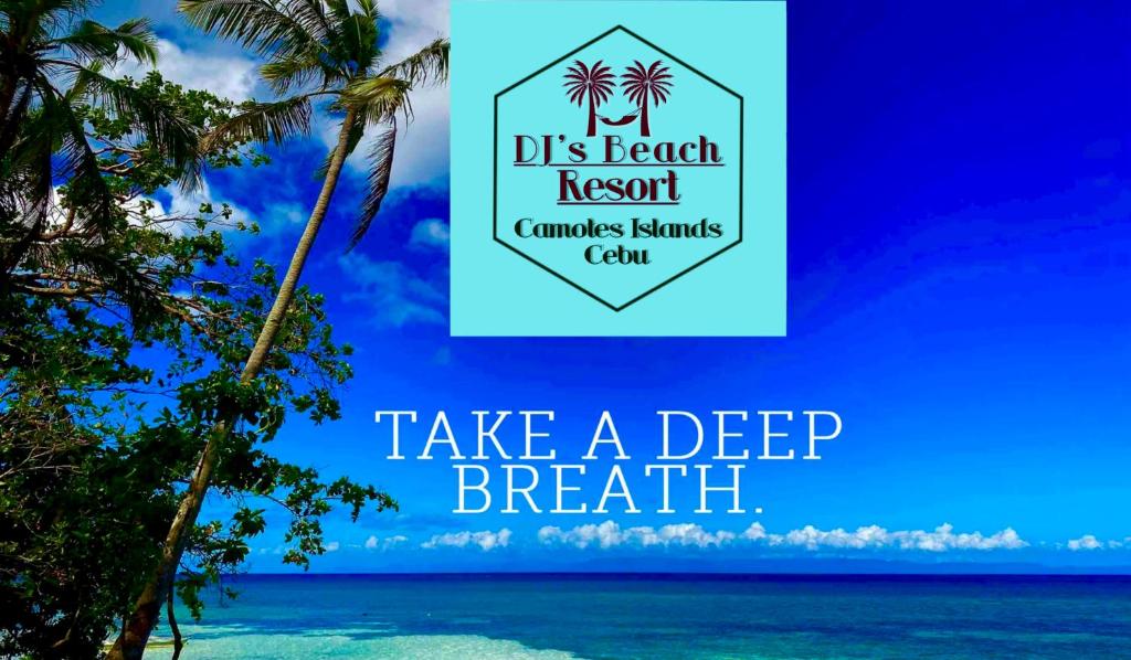 a sign that says take a deep breath at the beach at DJs Beach Resort in Union
