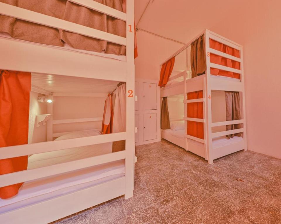 Postel nebo postele na pokoji v ubytování Macarena Hostel