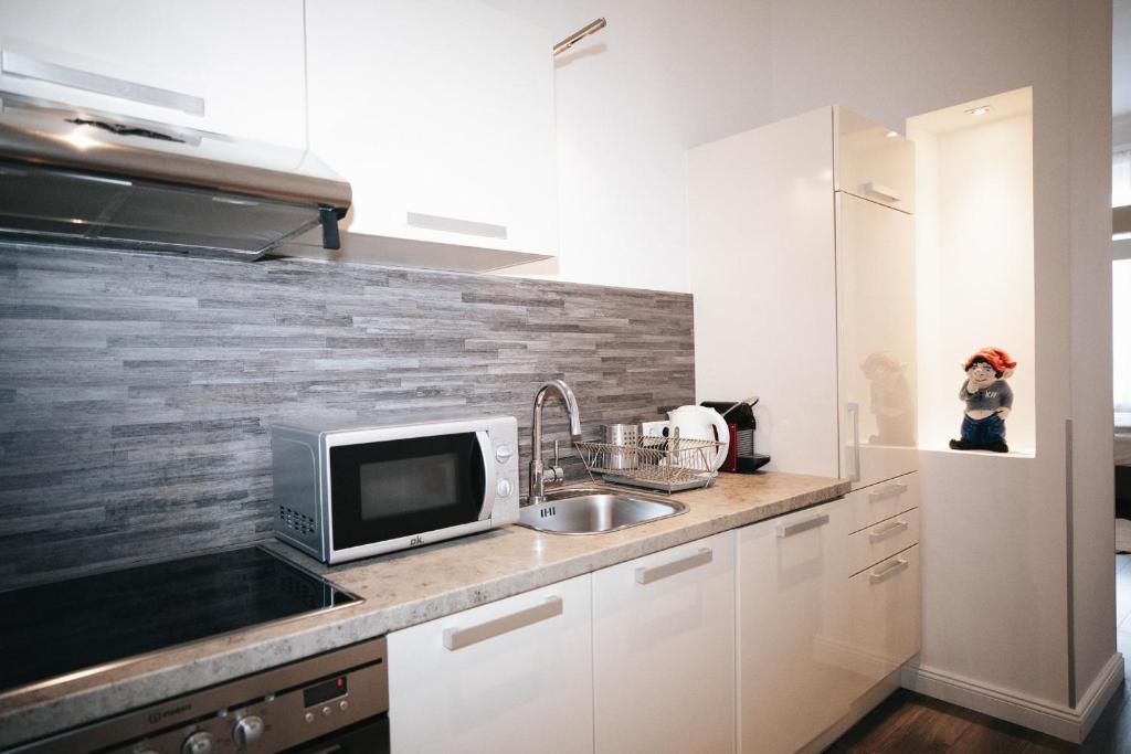 Kuchyňa alebo kuchynka v ubytovaní KH Apartments Universitaet