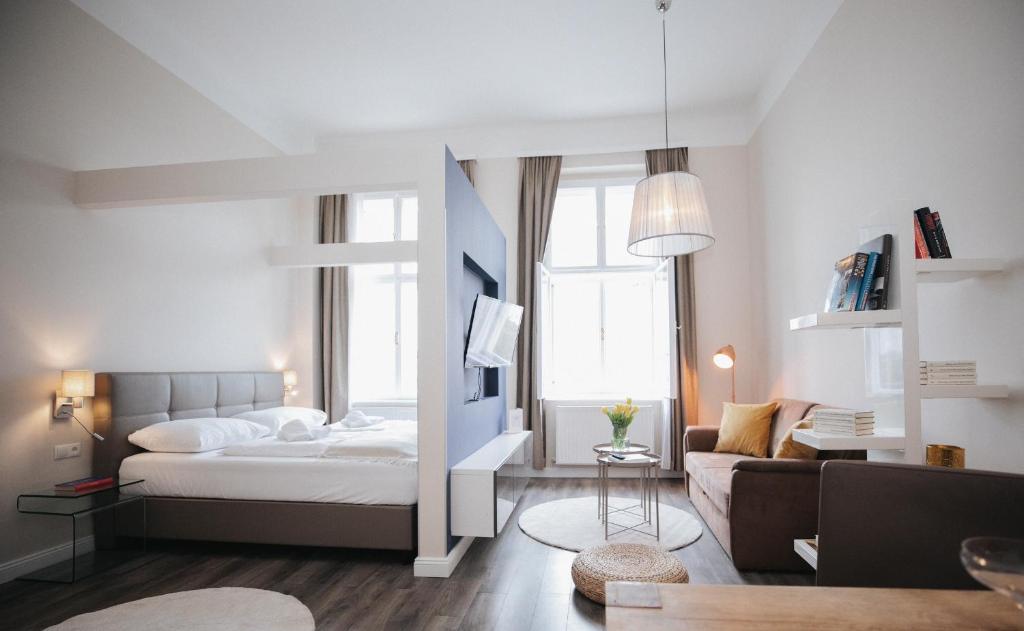 Posteľ alebo postele v izbe v ubytovaní KH Apartments Universitaet