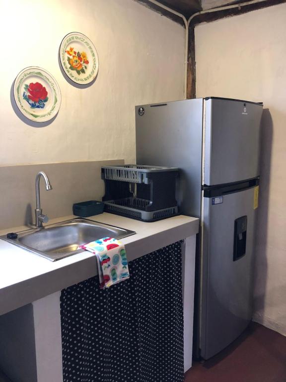 Kuchyň nebo kuchyňský kout v ubytování Hostal Los Orishas