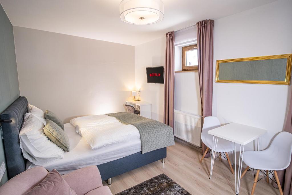 Postel nebo postele na pokoji v ubytování Boutique Apartments Old Town