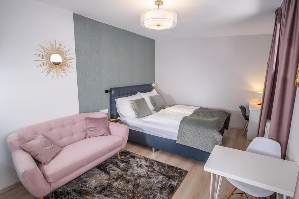 Postel nebo postele na pokoji v ubytování Boutique Apartments Old Town