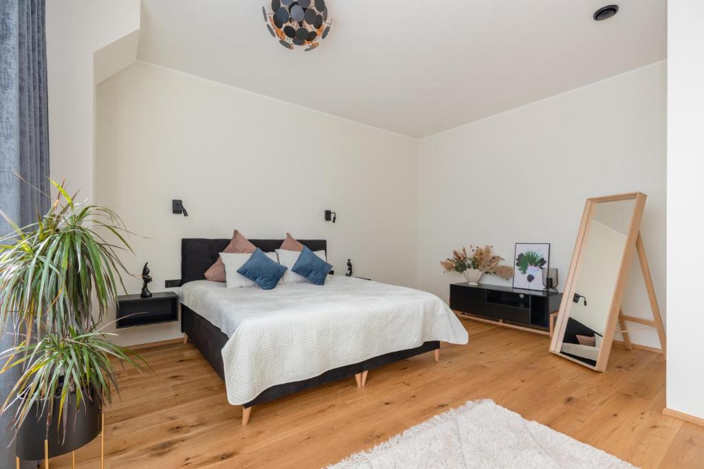 Postel nebo postele na pokoji v ubytování Sauna Apartment Tamula