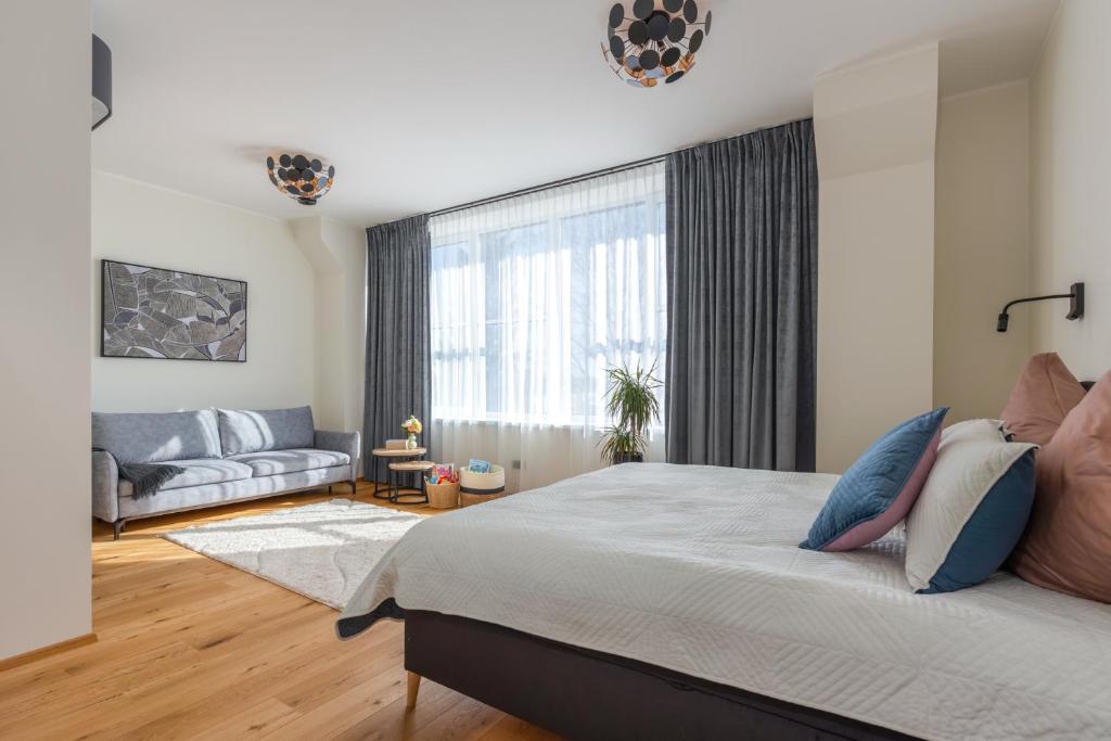 Postel nebo postele na pokoji v ubytování Sauna Apartment Tamula