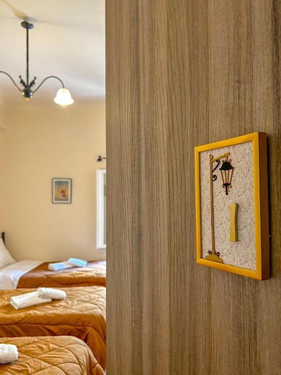 Postel nebo postele na pokoji v ubytování Central 9 Rooms