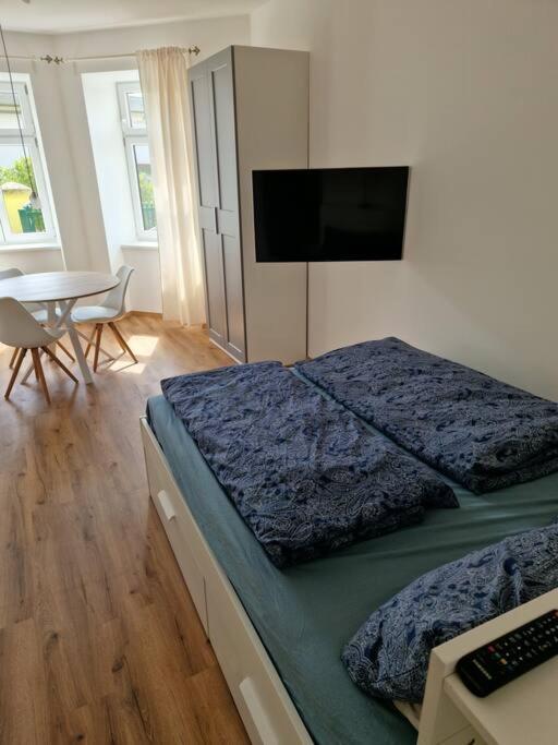 Postel nebo postele na pokoji v ubytování Beethoven29 / Studio mit Garten direkt in Krems