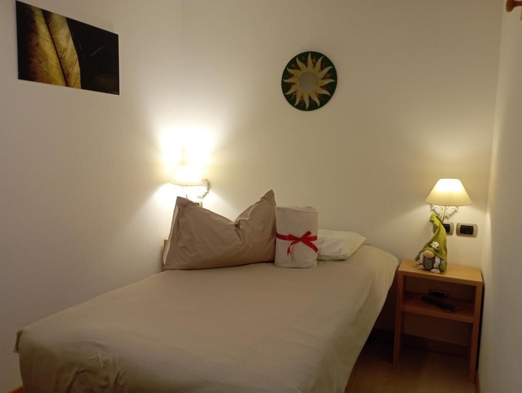 Postel nebo postele na pokoji v ubytování Camere Nordest Sudest- Conca Agordina