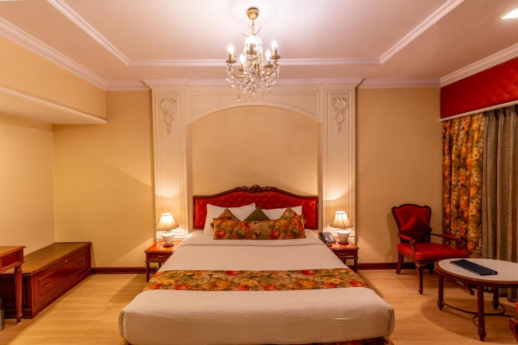 Postel nebo postele na pokoji v ubytování Hotel Hardeo