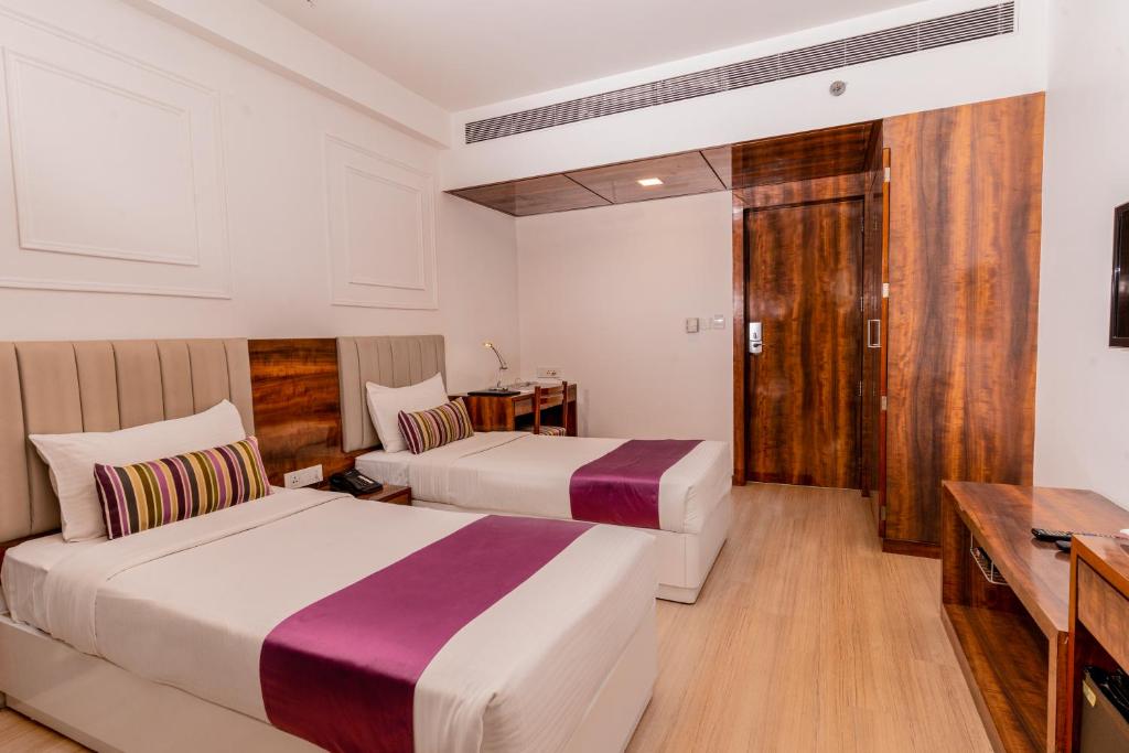 Postel nebo postele na pokoji v ubytování Hotel Hardeo