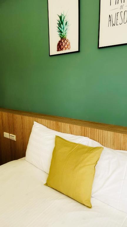 Postel nebo postele na pokoji v ubytování 古栗Chestnut Guest House-可包棟民宿
