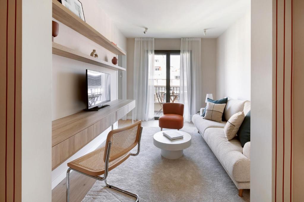 TV a/nebo společenská místnost v ubytování C211 Barcelona Apartments