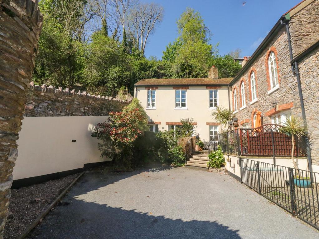 an exterior view of a house with a driveway at 4 Old Mill Court in Brixham