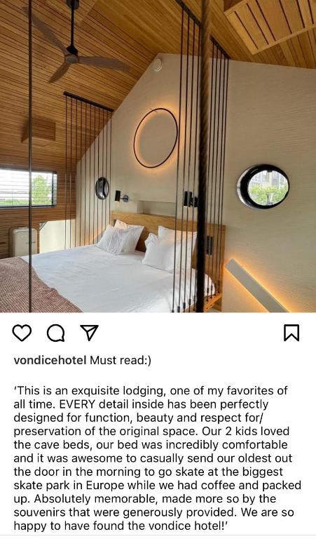 Postel nebo postele na pokoji v ubytování vondice hotel