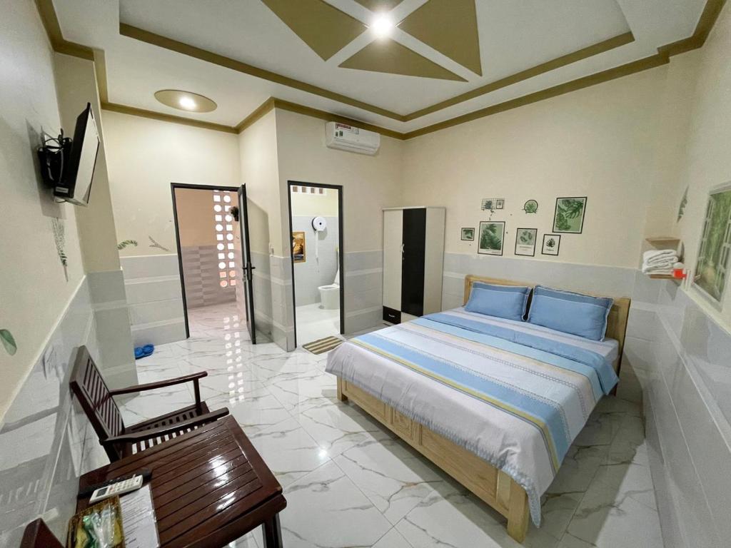 Giường trong phòng chung tại T'H Homestay