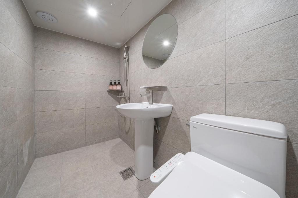 Koupelna v ubytování Aank Hotel Guri