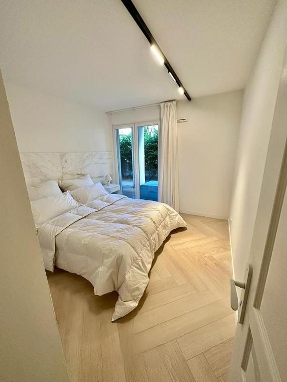Posteľ alebo postele v izbe v ubytovaní CAM0 - appartement 2 chambres en rez-de-terrasse