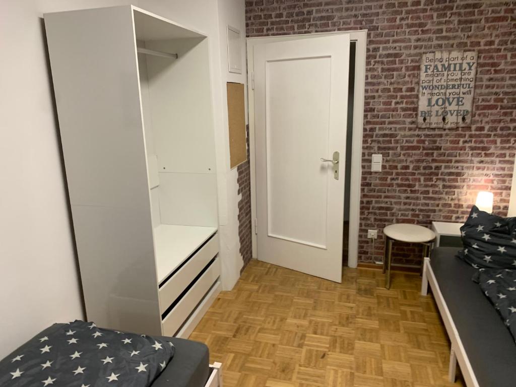 Postel nebo postele na pokoji v ubytování Mainpark Apartment 4 Schlafzimmer bis zu 10 Personen direkt über AschaffApartment bei Aschaffenburg