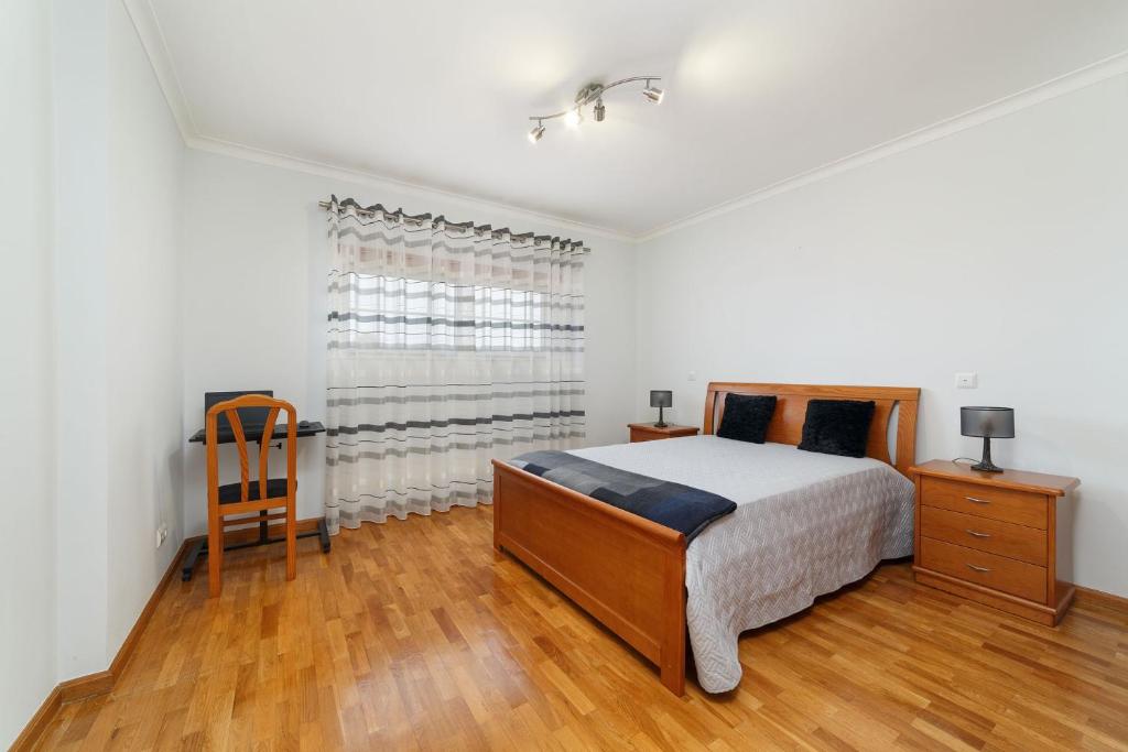 Cama ou camas em um quarto em Casa do Monte Amarelo